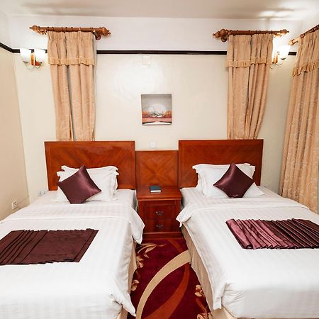 קיגאלי Highlands Suites Hotel And Apartments מראה חיצוני תמונה