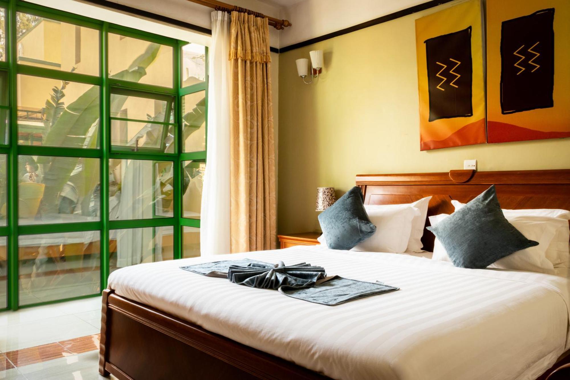 קיגאלי Highlands Suites Hotel And Apartments מראה חיצוני תמונה