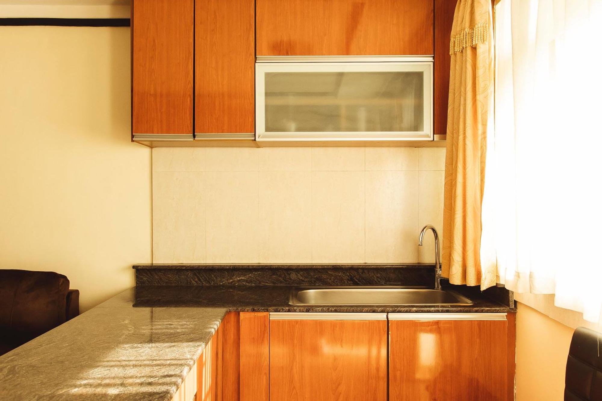 קיגאלי Highlands Suites Hotel And Apartments מראה חיצוני תמונה