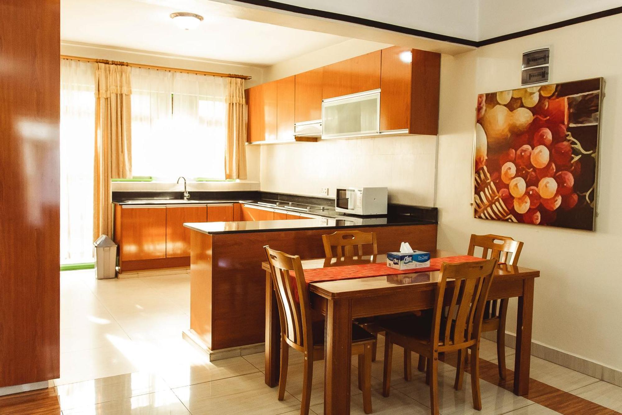 קיגאלי Highlands Suites Hotel And Apartments מראה חיצוני תמונה