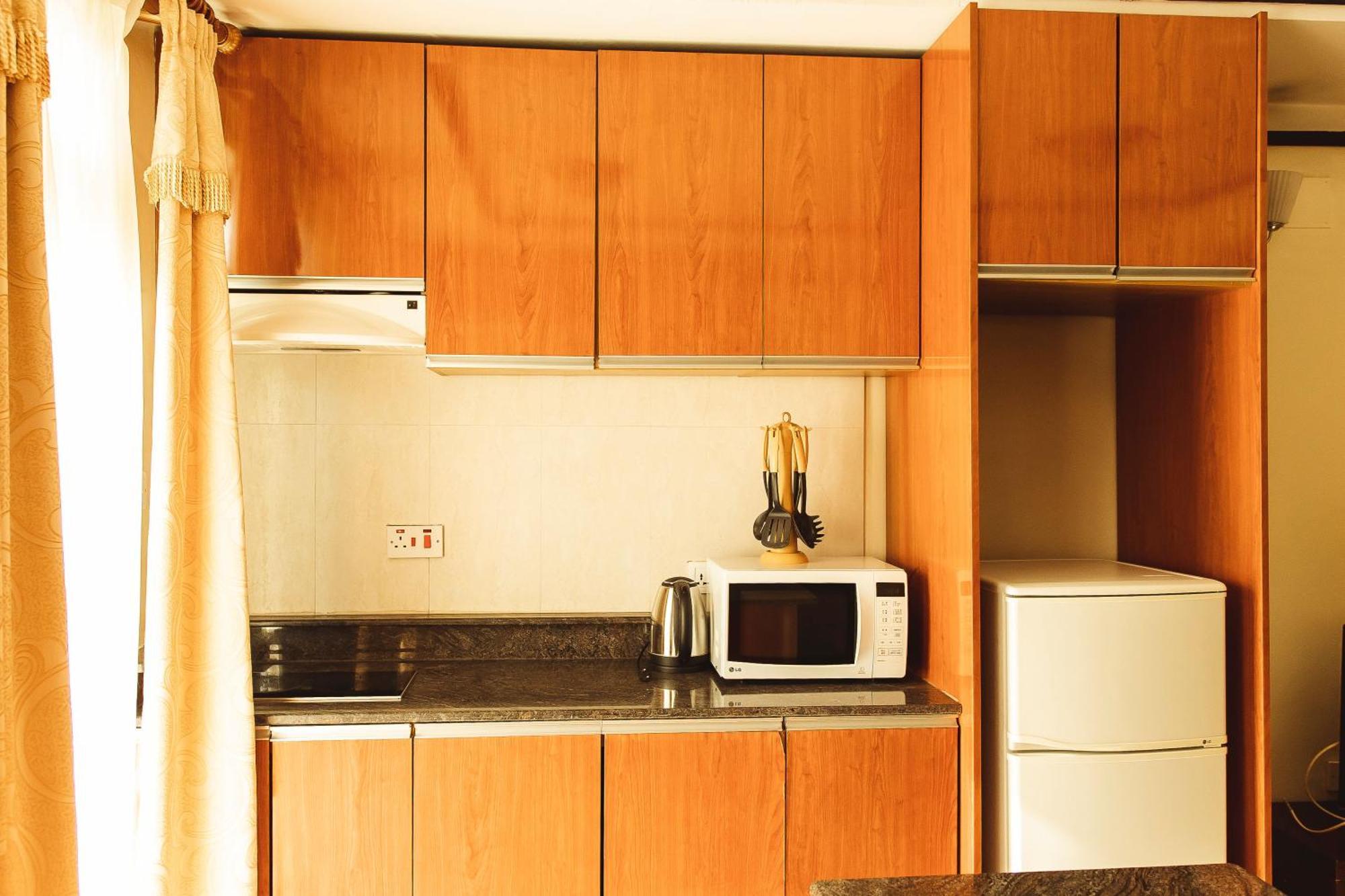 קיגאלי Highlands Suites Hotel And Apartments מראה חיצוני תמונה