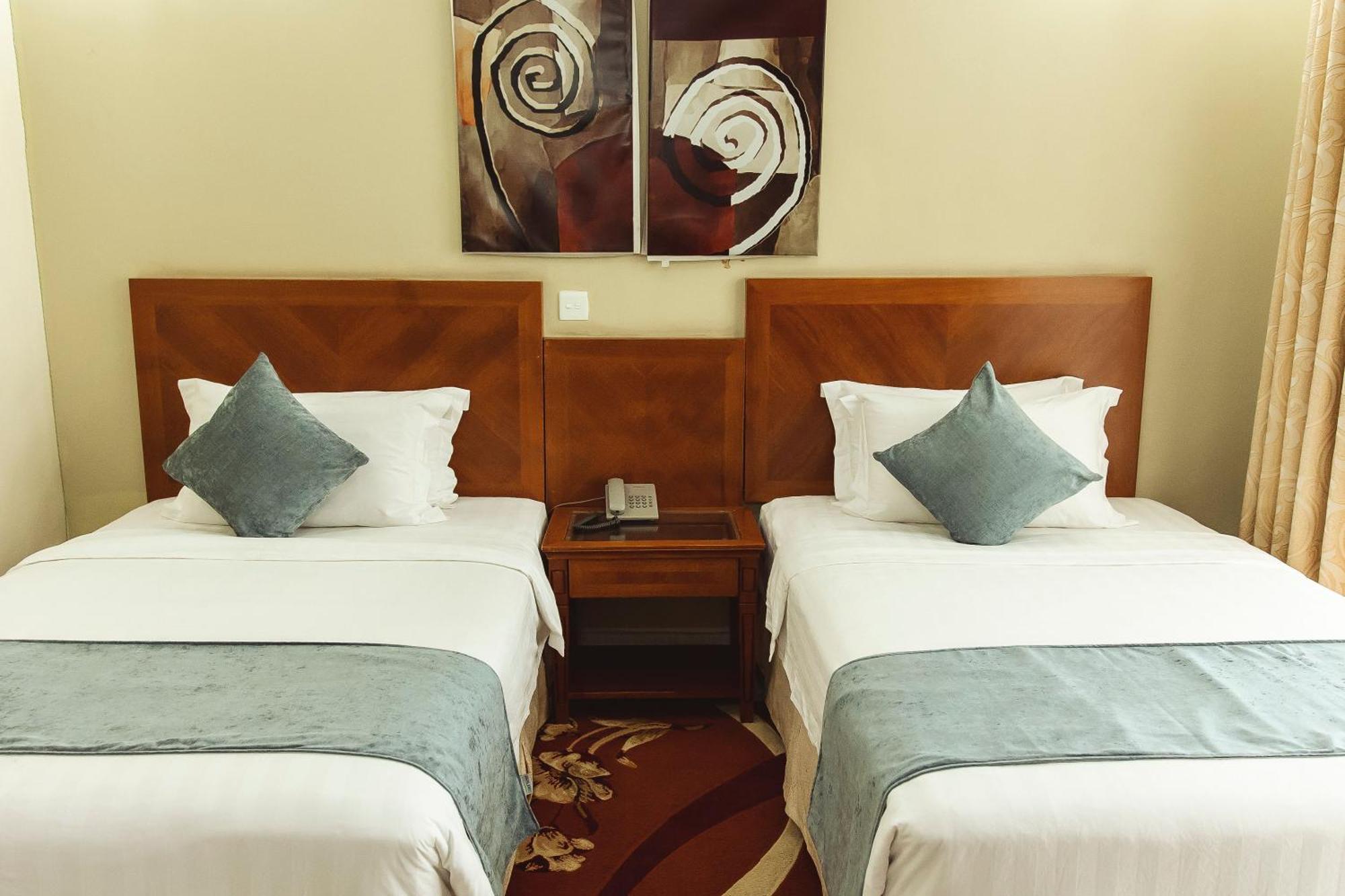 קיגאלי Highlands Suites Hotel And Apartments מראה חיצוני תמונה