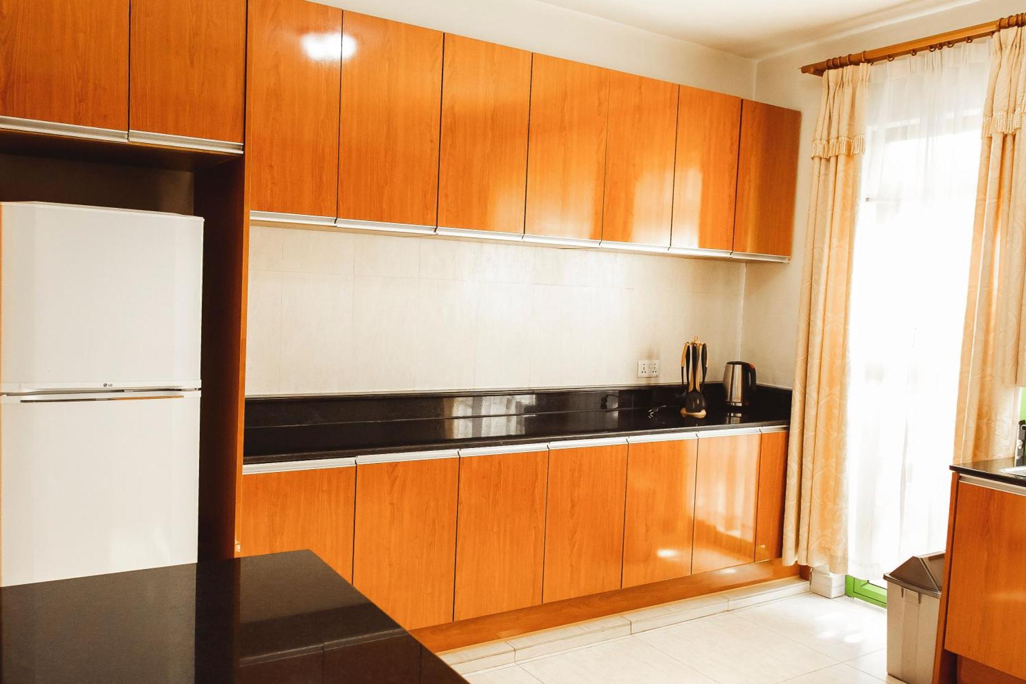קיגאלי Highlands Suites Hotel And Apartments מראה חיצוני תמונה